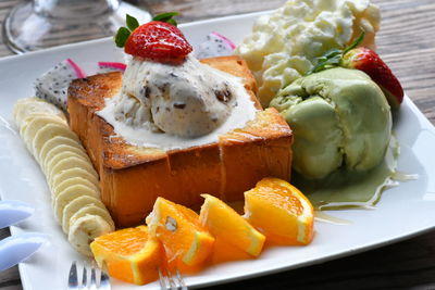 Close-up of fruits in plate