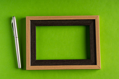 Directly above shot of empty green table