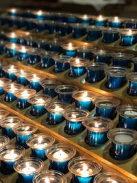 High angle view of illuminated candles