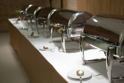 Close-up of empty seats on table in restaurant