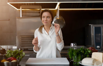 Young woman holding food