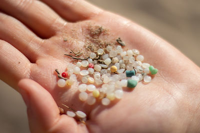 Close-up of person holding hands