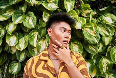 Portrait of young man looking away