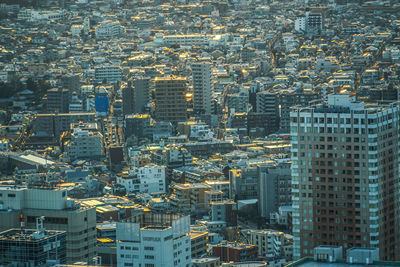 High angle view of modern buildings in city