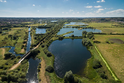 High angle view of country park against sky on sunny day