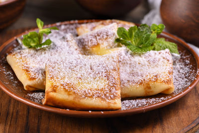 Close-up of food in plate on table