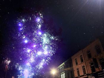 Low angle view of firework display
