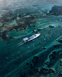 High angle view of abandoned boat on beach