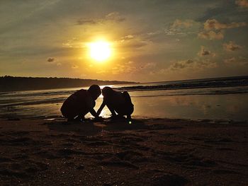 Scenic view of sea at sunset