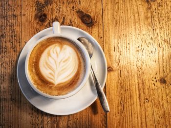 Directly above shot of cappuccino on table