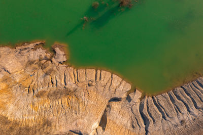 High angle view of rock formation in water