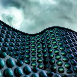 Low angle view of building against blue sky
