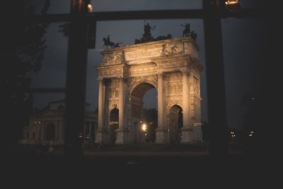 Statue of liberty against sky at night