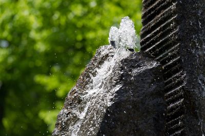 Close-up of water splashing on fountain