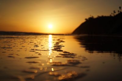 Scenic view of sunset over river