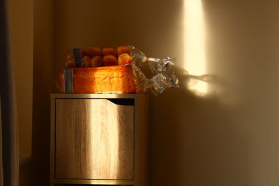 Close-up of wine in jar on wall