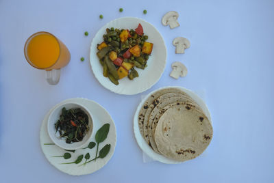 High angle view of breakfast served on table