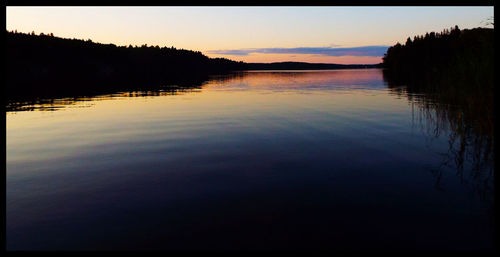 Scenic view of sea at sunset