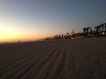 Scenic view of beach at sunset