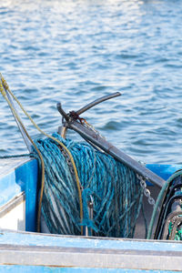 Close-up of fishing boat in sea