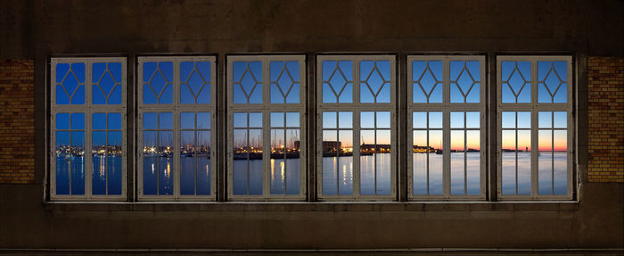 Reflection of building on glass window