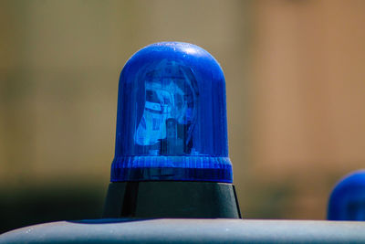 Close-up of blue car