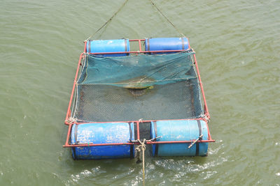High angle view of boat moored in lake
