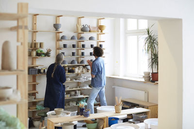 Man and woman in art studio