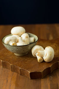 Close-up of mushrooms on cutting board