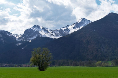 Scenic view of snowcapped mountains against sky