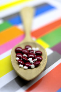 Close-up of multi colored candies on table