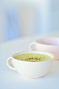 Close-up of tea cup on table