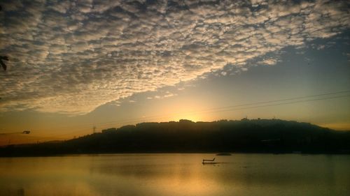 Scenic view of sea at sunset