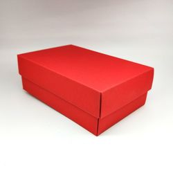 High angle view of red box against white background