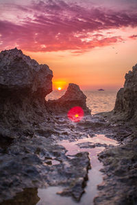 Scenic view of sea against sky during sunset