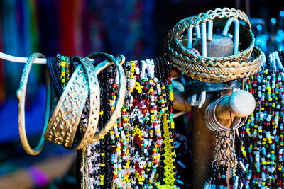 Close-up of colorful jewelries for sale at market