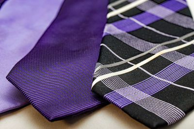 Close-up of purple neckties