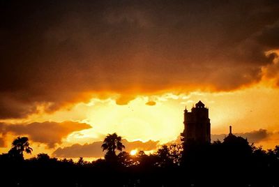 Scenic view of dramatic sky at sunset