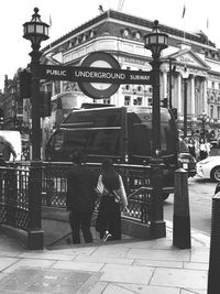 People walking on street in city