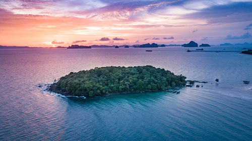 Scenic view of sea against sky at sunset