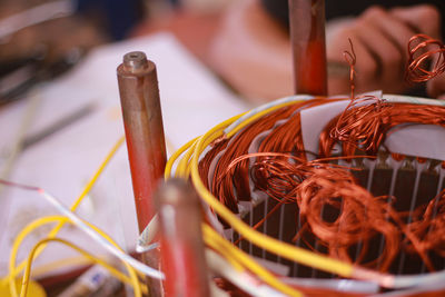 Close-up of metal cables on table