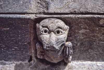 Close-up of statue against wall