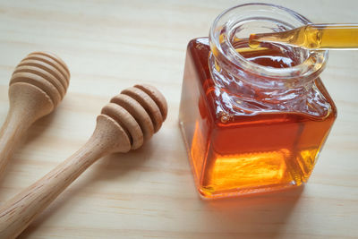 Close-up of drink in glass jar on table