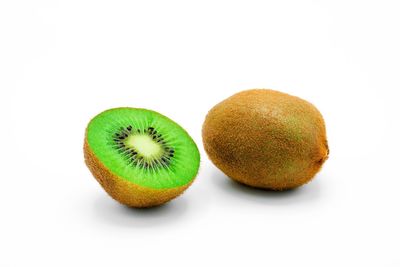 Close-up of fruits against white background