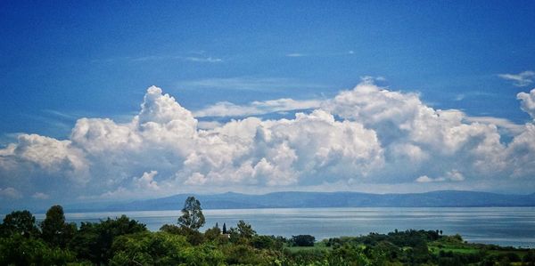 Scenic view of sea against blue sky