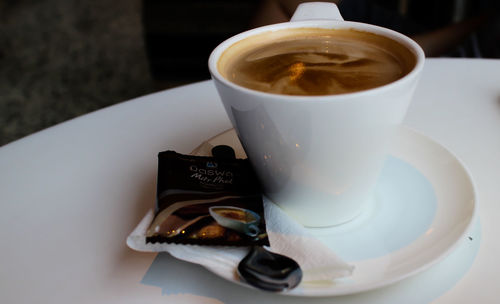 Close-up of cappuccino on table