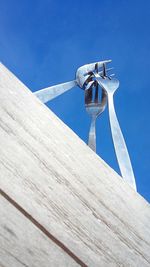 Low angle view of built structure against blue sky