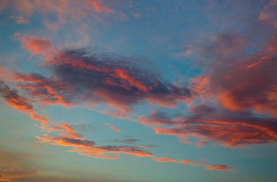 Low angle view of dramatic sky during sunset