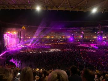 Crowd at music concert at night