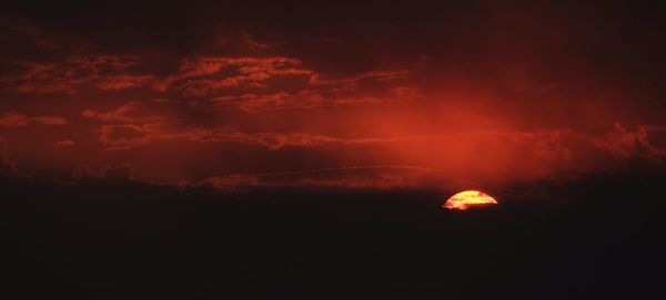 Low angle view of dramatic sky at sunset